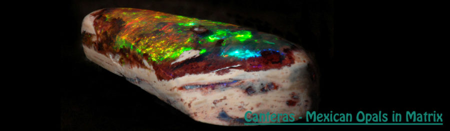 A long irregular fire opal region contains high quality fire throughout